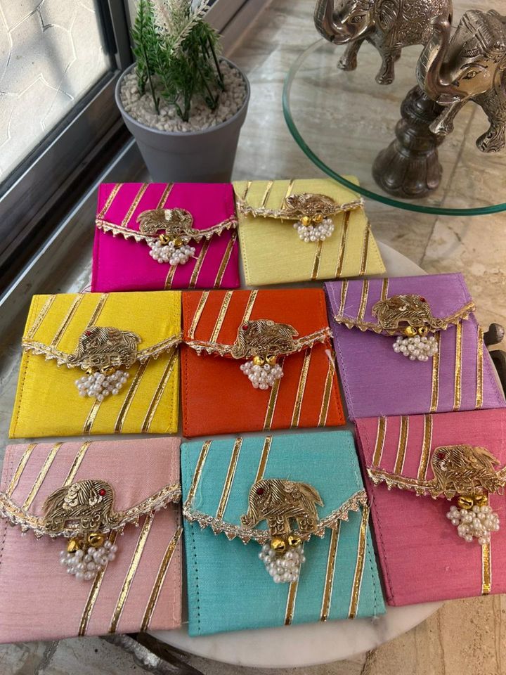 Handmade Silk Potli Clutch | Elephant Motif, Pearl Tassels, Zari Detail