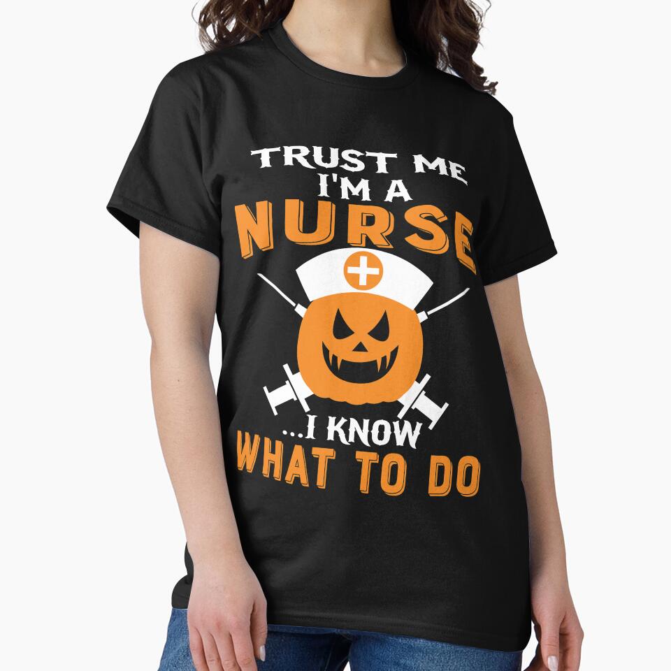 Trust me I' a nurse Halloween pumpkin head Nurse Tees by Hema Thilakaratne