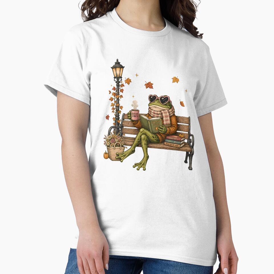Cozy Autumn Frog Reading Book on Bench Fall Aesthetic by BeataPrint