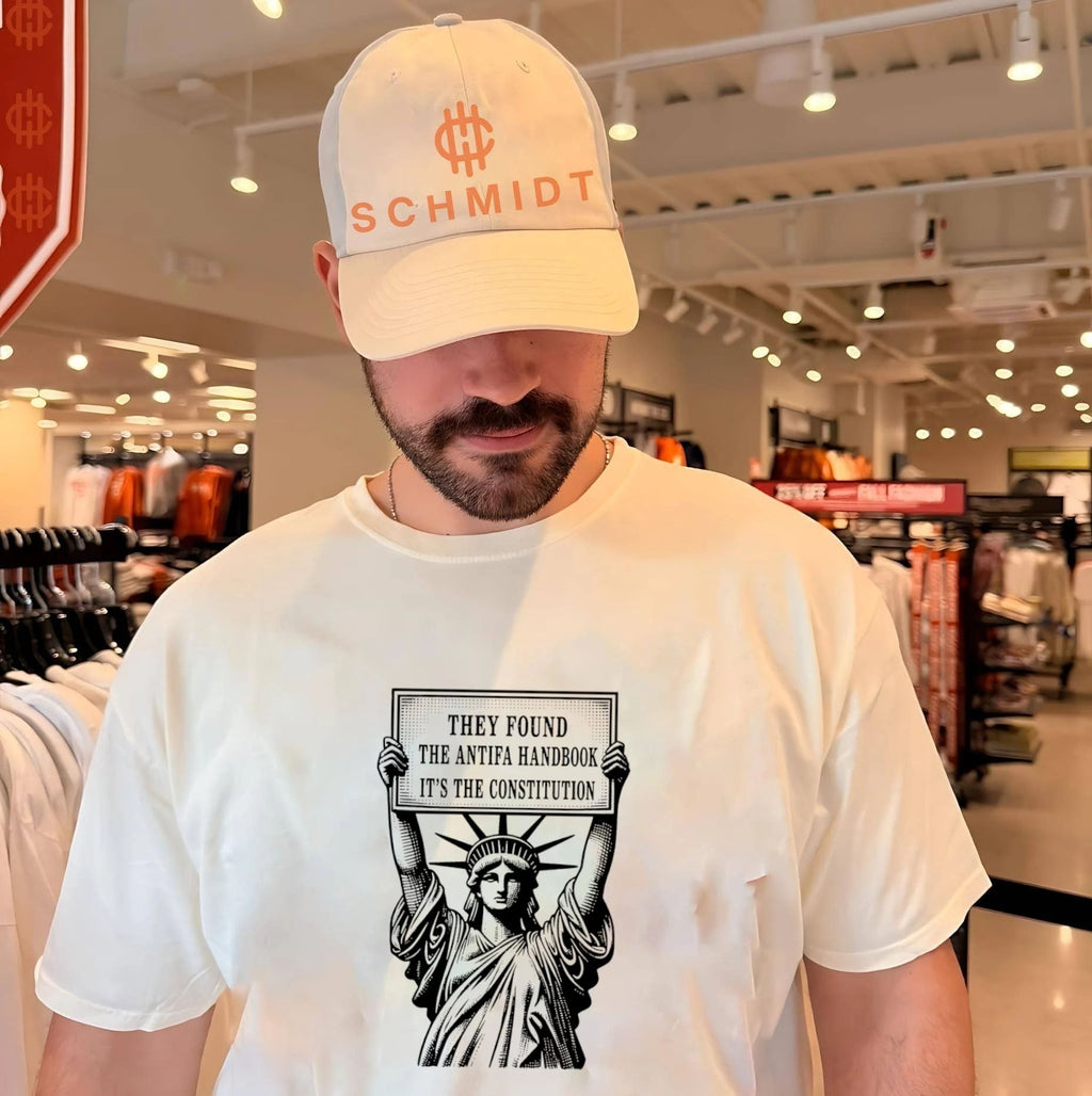 Statue of Liberty holding sign they found the antifa handbook it’s the constitution shirt